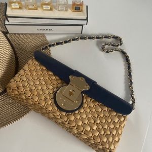 Straw Michael Kors purse with leather and gold detail
